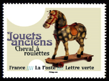  Jouets anciens <br>Cheval à roulettes